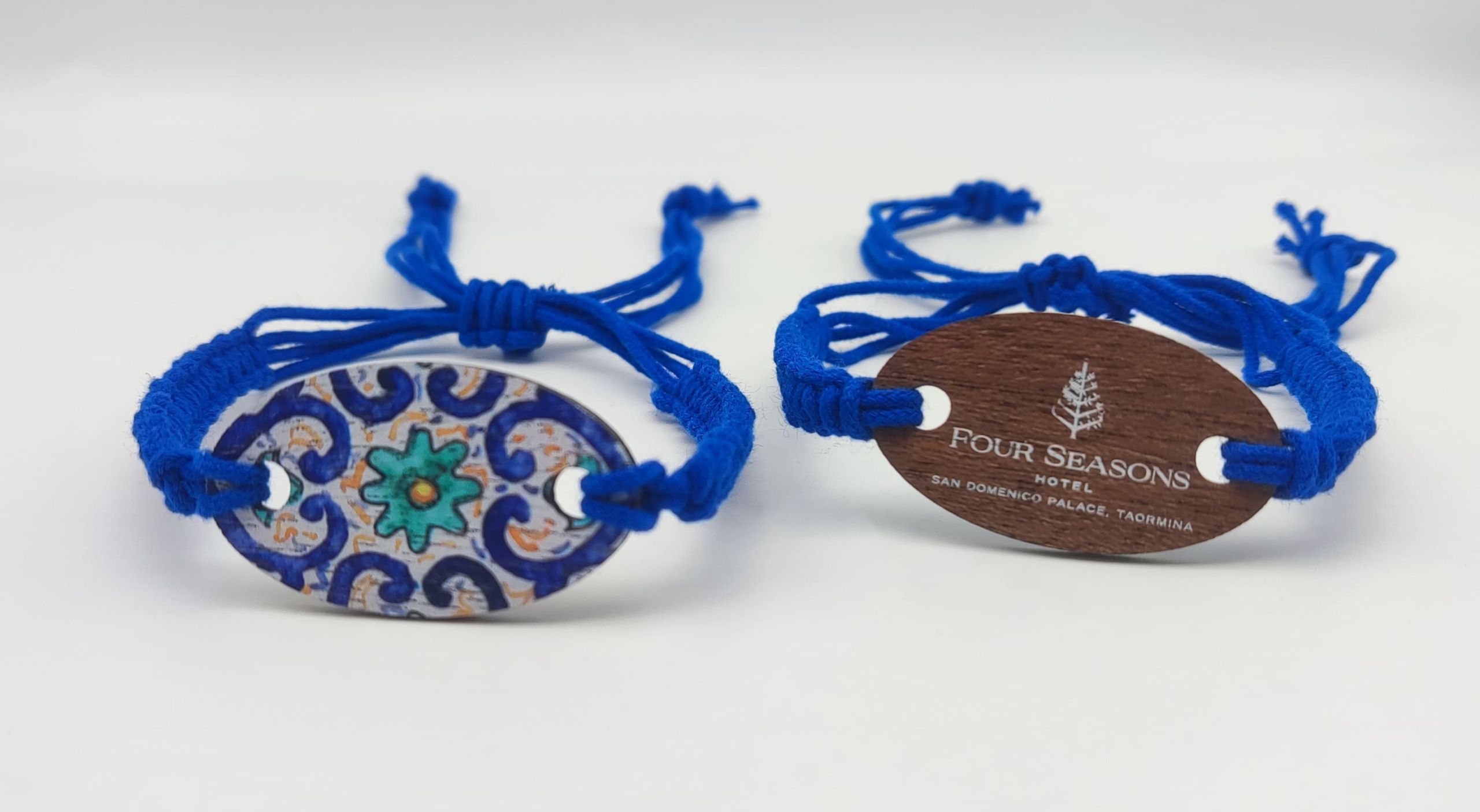 Mediterranean ceramic-inspired RFID wristband with Sicilian patterns and Four Seasons branding