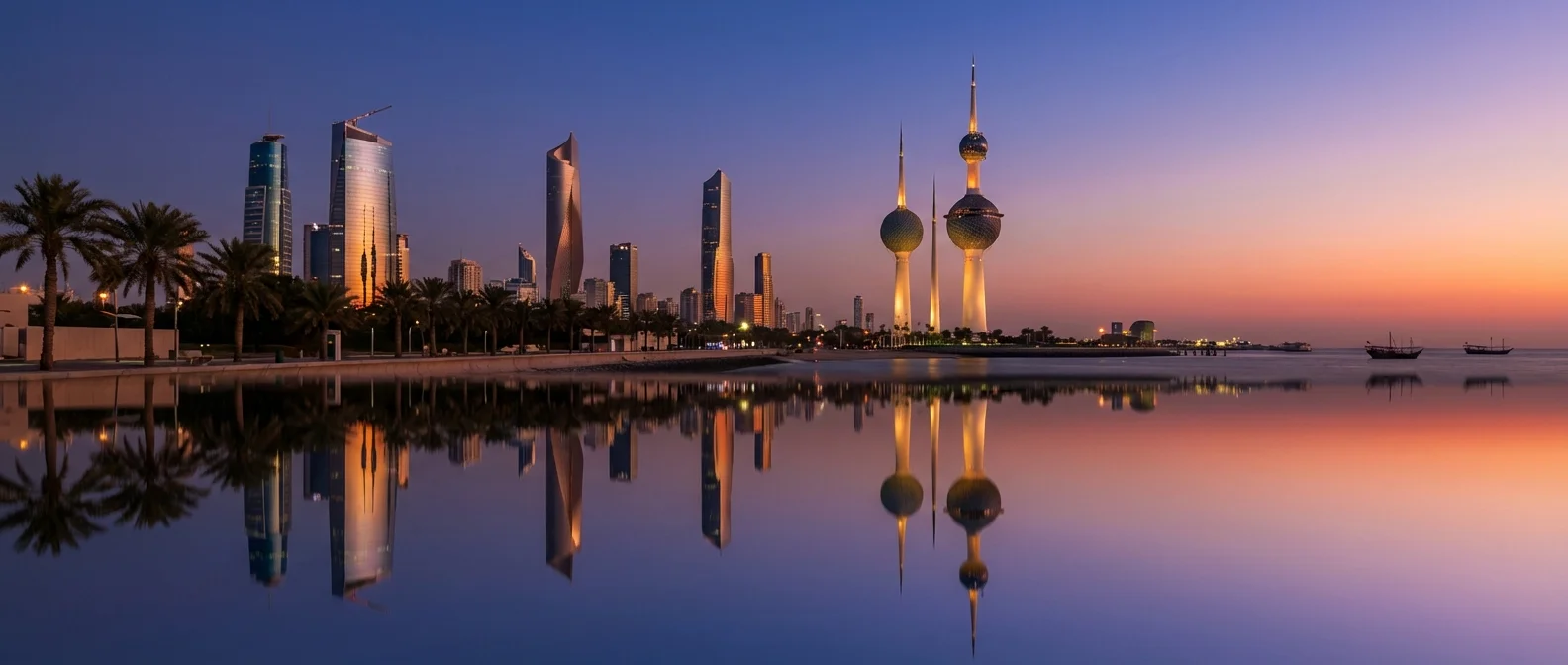 Kuwait City skyline at blue hour with Kuwait Towers and Arabian Gulf